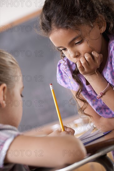 Schoolgirls in classroom. 
Photo: Rob Lewine