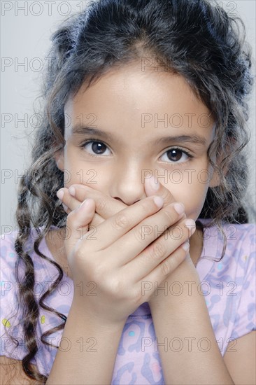 Portrait of girl (6-7), studio shot. 
Photo : Rob Lewine