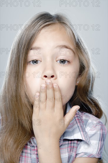 Portrait of girl (6-7), studio shot. 
Photo: Rob Lewine