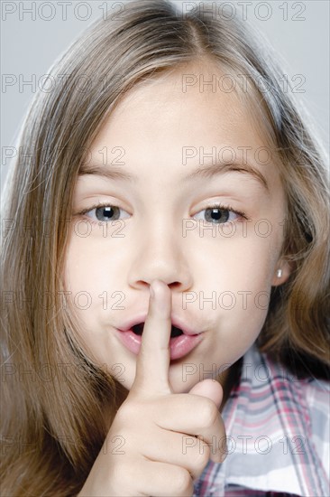 Portrait of girl (6-7), studio shot. 
Photo: Rob Lewine