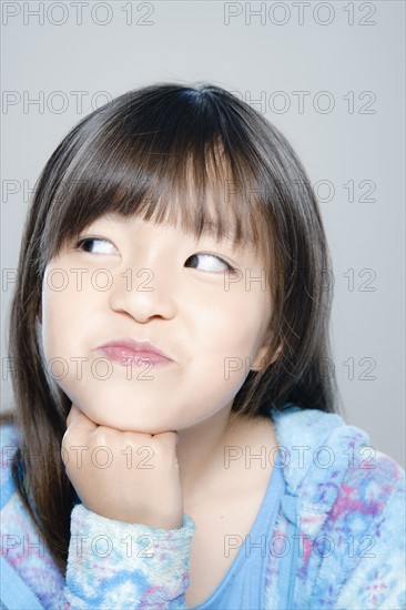 Portrait of girl (8-9), studio shot. 
Photo: Rob Lewine