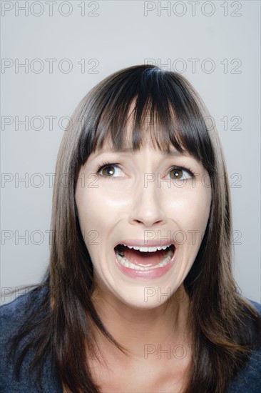 Portrait of young woman, studio shot. 
Photo: Rob Lewine