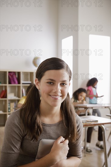 Portrait of schoolgirl (12-13). 
Photo : Rob Lewine