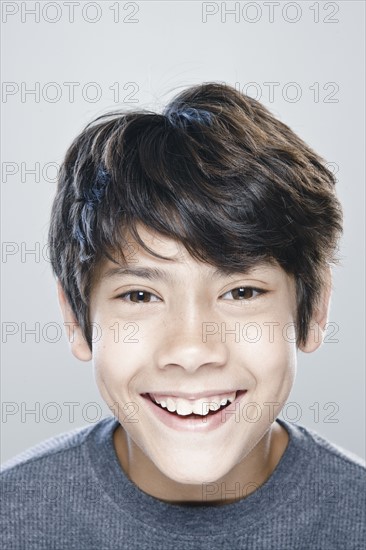 Portrait of boy (12-13) expressing positively. 
Photo : Rob Lewine