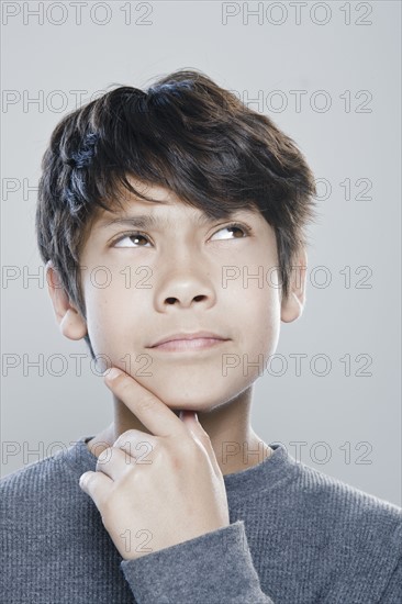 Portrait of boy (12-13) expressing contemplation. 
Photo : Rob Lewine