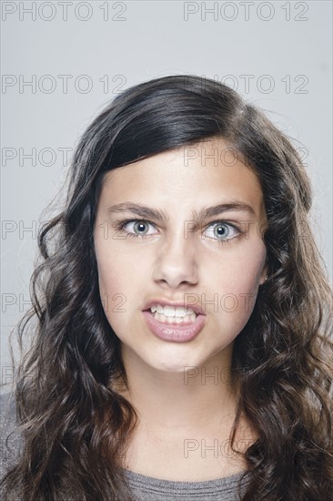 Portrait of girl (12-13), studio shot. 
Photo : Rob Lewine