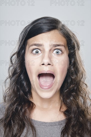 Portrait of girl (12-13), studio shot. 
Photo : Rob Lewine