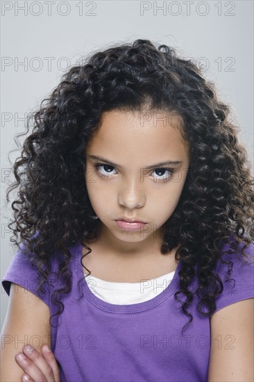 Portrait of girl (10-11), studio shot. 
Photo : Rob Lewine