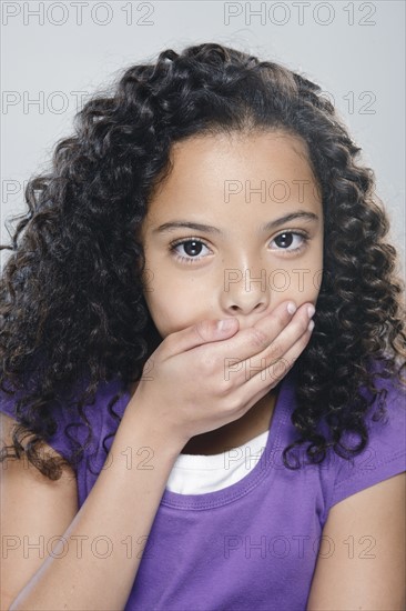 Portrait of girl (10-11), studio shot. 
Photo : Rob Lewine