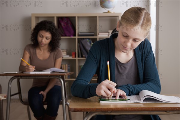 Teenage girls (14-15,16-17) at school. 
Photo : Rob Lewine