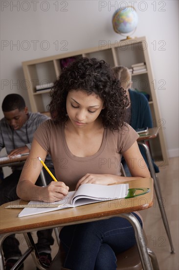 Teenage students (14-15, 16-17) at school. 
Photo : Rob Lewine