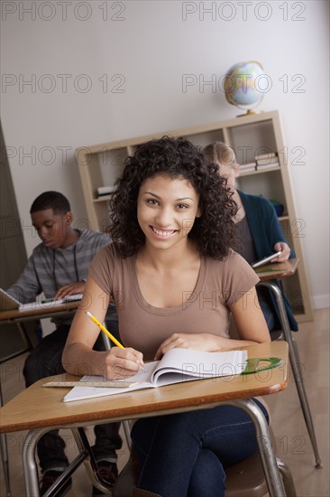 Teenage students (14-15, 16-17) at school. 
Photo : Rob Lewine