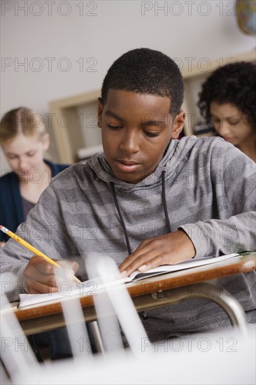 Teenage students (14-15, 16-17) at school. 
Photo : Rob Lewine