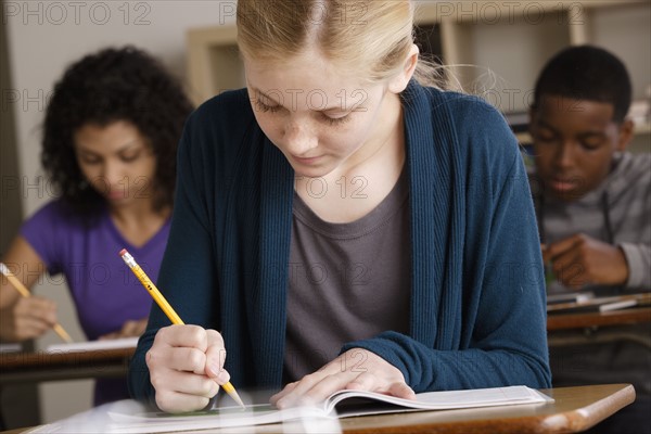 Teenage students (14-15, 16-17) at school. 
Photo : Rob Lewine