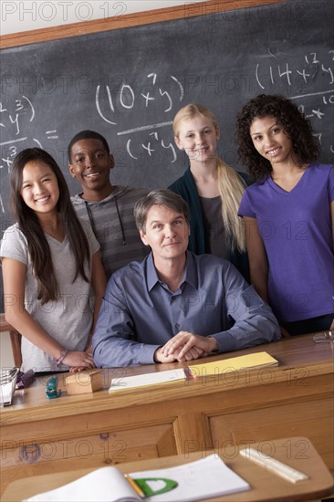 Teacher with teenage students (14-15,16-17) at school. 
Photo : Rob Lewine