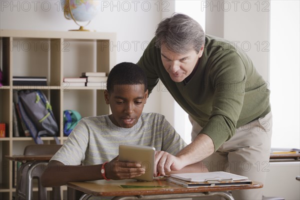 Teacher and schoolboy (14-15). 
Photo : Rob Lewine