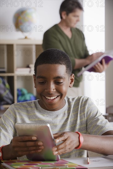 Teacher and schoolboy (14-15). 
Photo : Rob Lewine