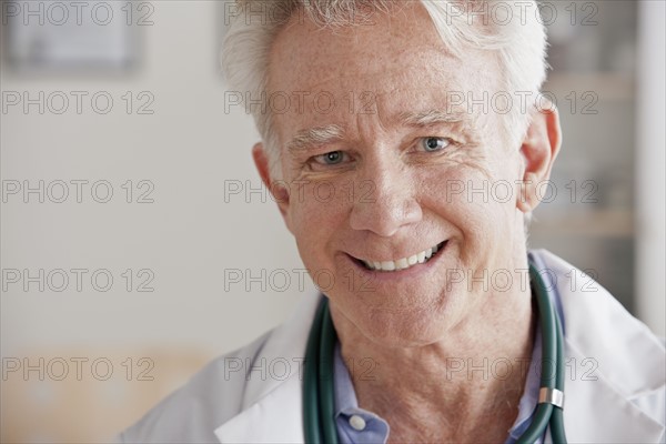 Portrait of senior doctor. 
Photo : Rob Lewine