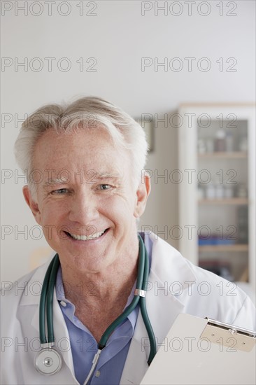 Portrait of senior doctor. 
Photo : Rob Lewine