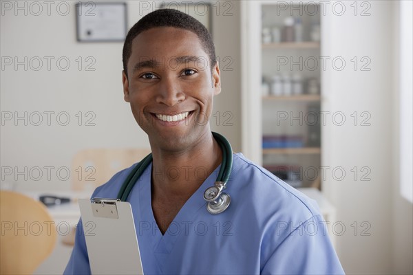 Portrait of young doctor. 
Photo : Rob Lewine