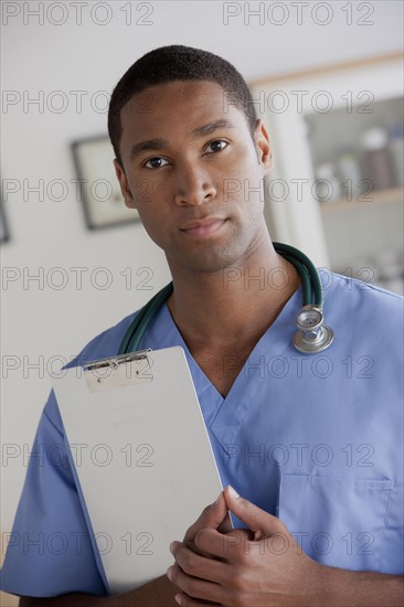 Portrait of young doctor. 
Photo : Rob Lewine