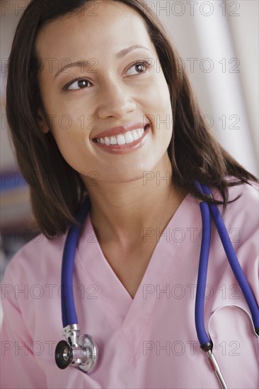 Portrait of young female doctor. 
Photo : Rob Lewine