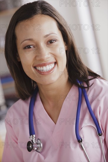 Portrait of young female doctor. 
Photo : Rob Lewine