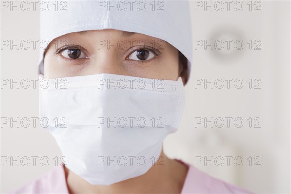 Portrait of doctor wearing surgical mask. 
Photo: Rob Lewine