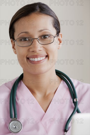 Portrait of female doctor. 
Photo : Rob Lewine