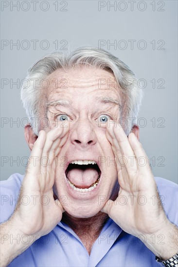 Portrait of screaming senior man, studio shot. 
Photo: Rob Lewine