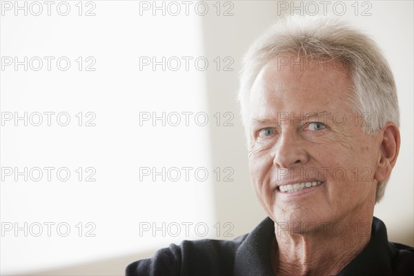 Portrait of smiling senior man. 
Photo: Rob Lewine