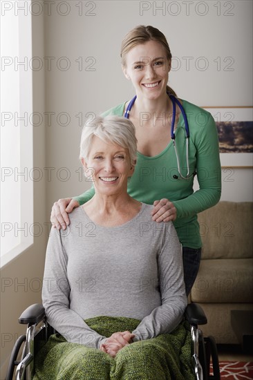 Portrait of young female nurse and senior woman. 
Photo : Rob Lewine