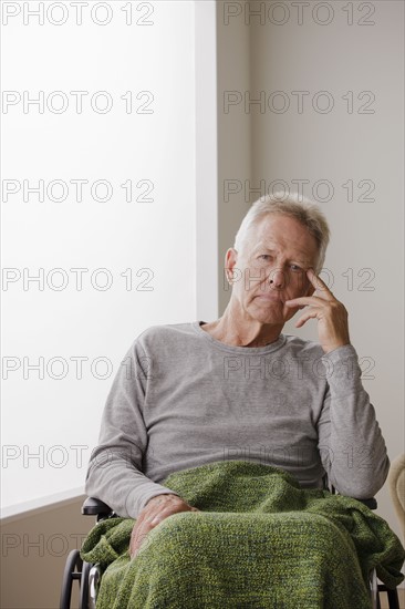 Portrait of senior man on wheelchair. 
Photo: Rob Lewine
