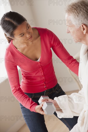 Female nurse with senior patient at home. 
Photo: Rob Lewine