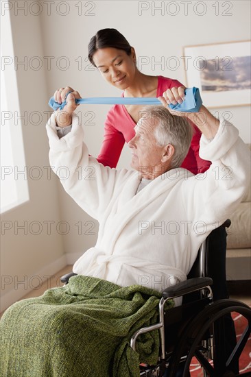 Female nurse with senior patient at home. 
Photo: Rob Lewine