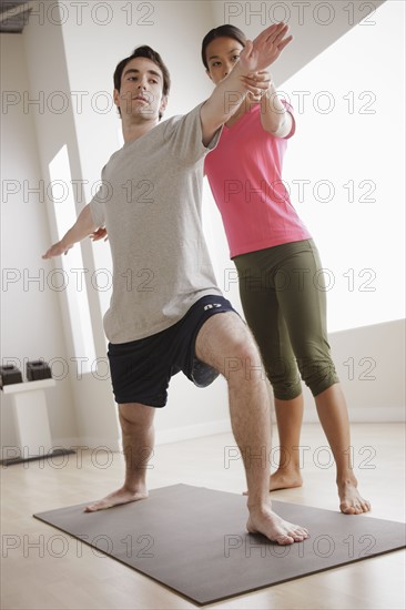 Young couple training together. 
Photo: Rob Lewine