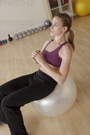 Young woman exercising. 
Photo: Rob Lewine