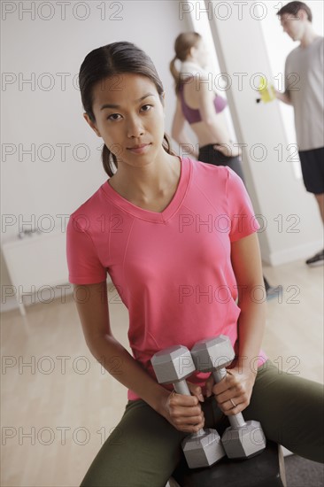 Young woman exercising. 
Photo: Rob Lewine