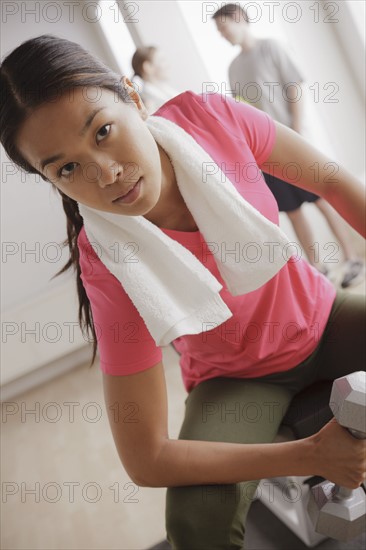 Young woman exercising. 
Photo : Rob Lewine