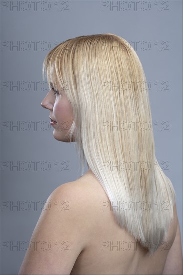 View of woman with blonde hair, studio shot. 
Photo: Mark de Leeuw