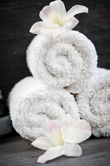 Still life with flowers and towels. 
Photo: Elena Elisseeva