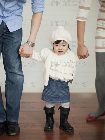 Young parents with baby girl (12-17 months). 
Photo : Jessica Peterson