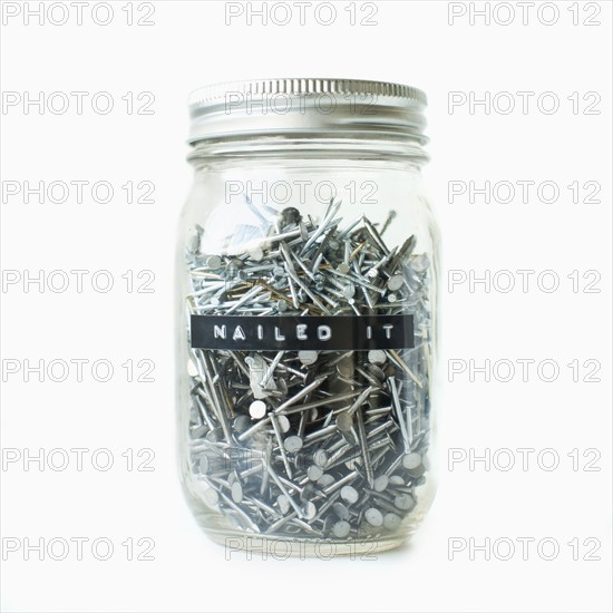 Nails in jar, studio shot. 
Photo : Jessica Peterson