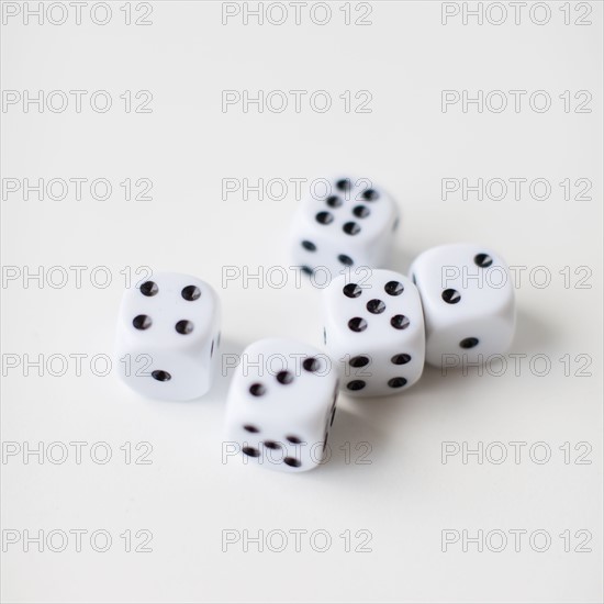 Dices on white background, studio shot. 
Photo: Jessica Peterson