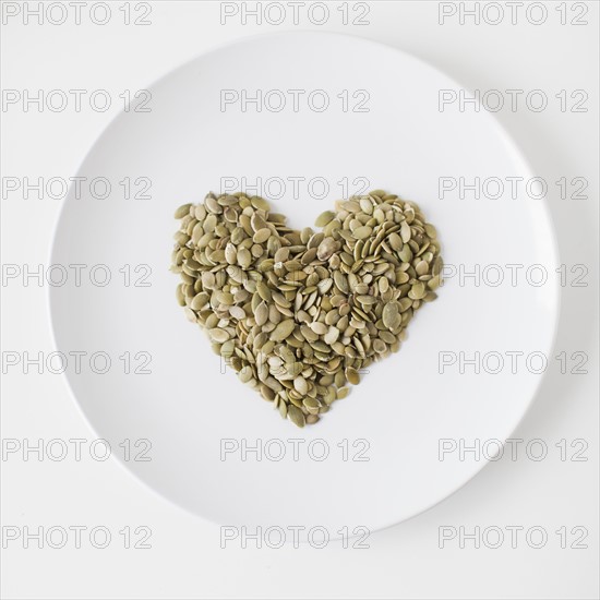 Seeds heart on plate, studio shot. 
Photo : Jessica Peterson