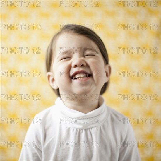 Portrait of happy mixed-race girl (2-3). 
Photo : Jessica Peterson