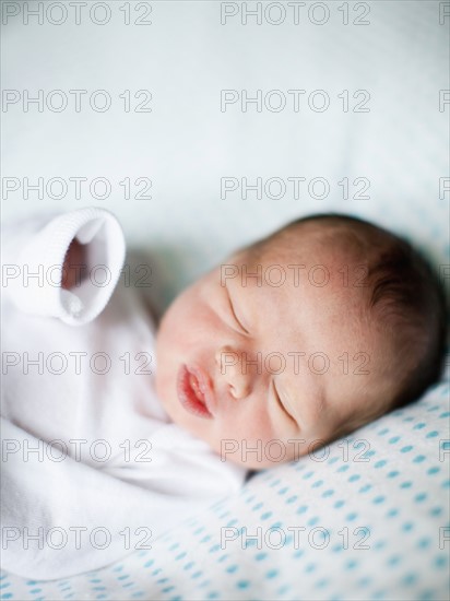 Portrait of newborn baby boy (2-5 months). 
Photo: Jessica Peterson