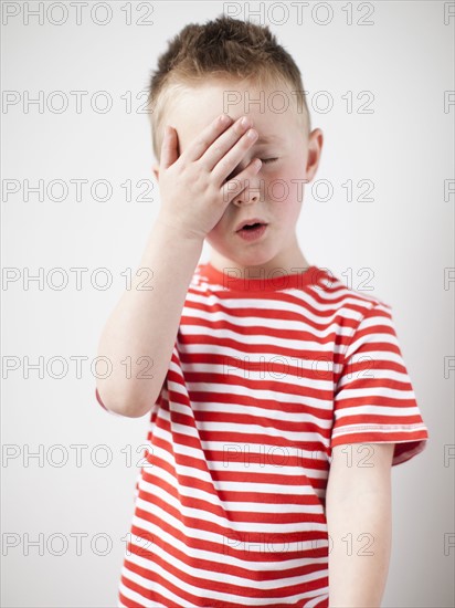 Portrait of sleepy male toddler (2-3) . 
Photo: Jessica Peterson