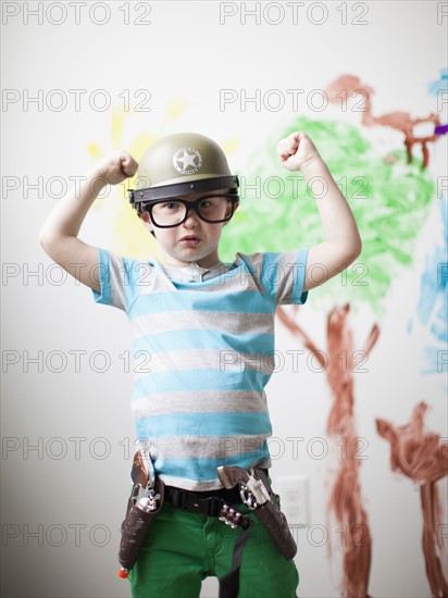 Toddler boy (2-3) in military costume . 
Photo : Jessica Peterson