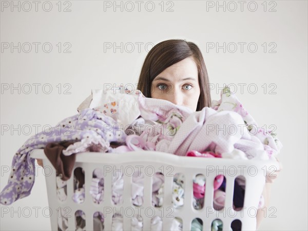 Young woman doing laundry. 
Photo: Jessica Peterson